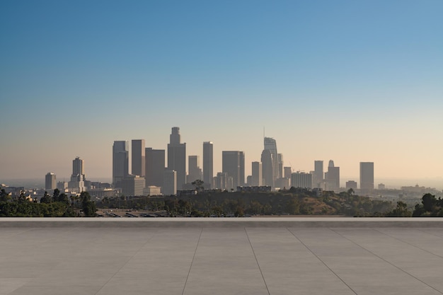 Foto rascacielos cityscape downtown los angeles skyline buildings beautiful real estate sunset vista en la azotea vacía concepto de éxito