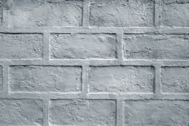 Raue weiße Backsteinmauerstruktur