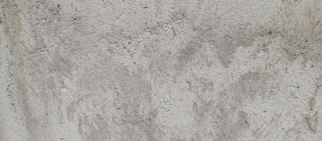 Raue Zementwand, rauer Zementwandhintergrund, aufgenommen aus einem Nahaufnahmewinkel