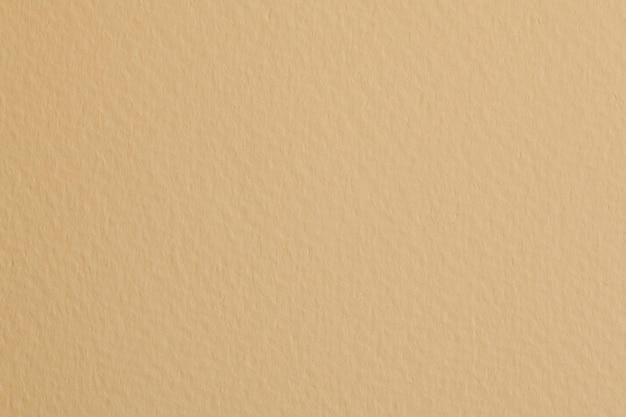 Rauer Kraftpapierhintergrund monochrome Papierstruktur beige Farbe Mockup mit Kopierraum für textxA