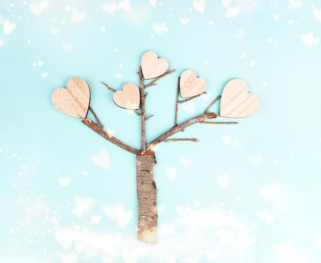 Árbol con corazones, concepto de amor y emoción, día de la madre y tarjeta de felicitación de San Valentín, positivo