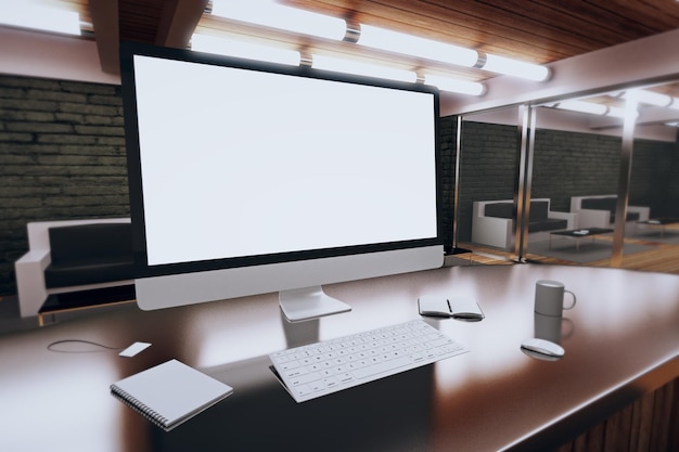 Área de trabalho de computador em branco com diário de caneca de café e outros acessórios na moderna sala de loft mock up