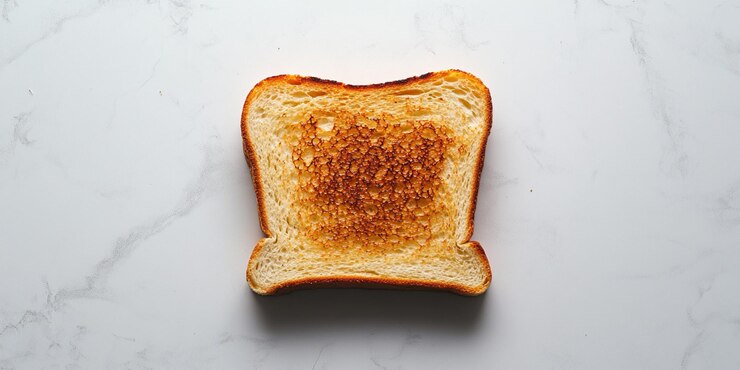una rebanada tostada de pan con la palabra tostada en ella