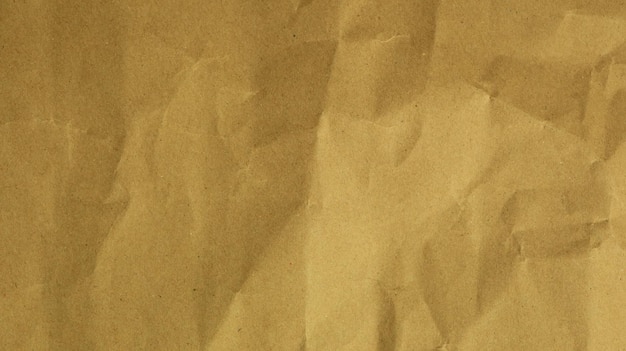 Reciclar fundo de textura de papel Fundo de forma abstrata de papel kraft velho amassado com espaço Papel amassado amarelo para alta resolução de texto