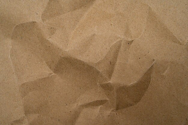 Foto reciclar fundo de textura de papel fundo de forma abstrata de papel kraft velho amassado com papel espacial para alta resolução de texto