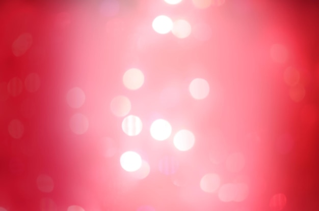 Red Christmas Glitter Lights Hintergrund Defokussierter abstrakter roter Hintergrund