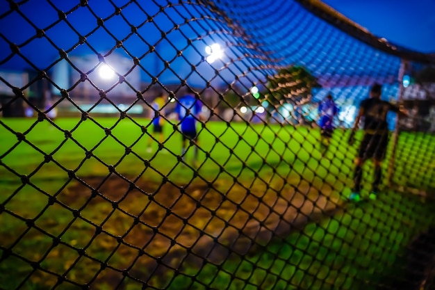 Red de portería de fútbol con fondo borroso