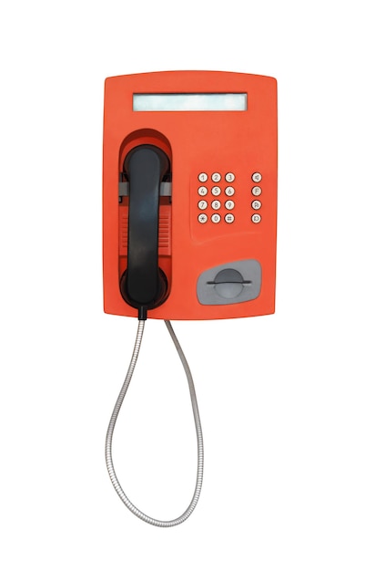 Red Vintage Münztelefon für Telefonkarten auf weißem Hintergrund