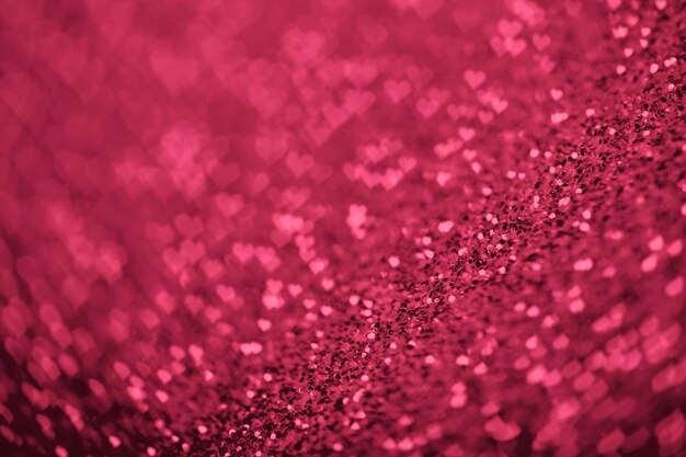 Red Viva Magenta Glitter Hintergrund mit Herzen Bokeh zum Valentinstag