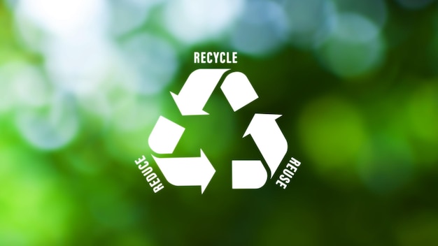 Reducir la reutilización símbolo de reciclaje en fondo bokeh verde concepto ecológico y salvar la tierra Una metáfora ecológica para la gestión ecológica de residuos y sostenible