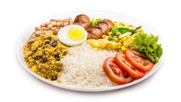 Foto refeição típica brasileira arroz e feijão salada de tomate ovo cozido e batata frita chamada de prato tradicional ou prato executivo