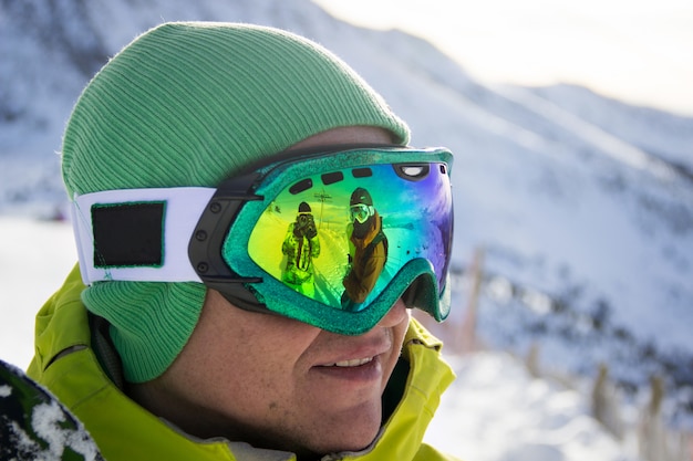 Reflejado en las gafas de snowboard