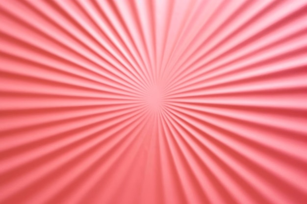 Foto reflejo de fondo de papel rosa de los rayos de luz sobre papel