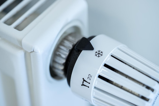 Regulador de calor en un calefactor cerrar imagen Costos de calefacción