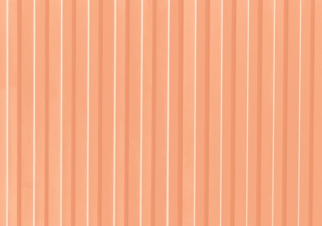 Relieferte Metallzaun Nahaufnahme Textur und Hintergrund Trendfarbe des Jahres 2024 Peach Fuzz