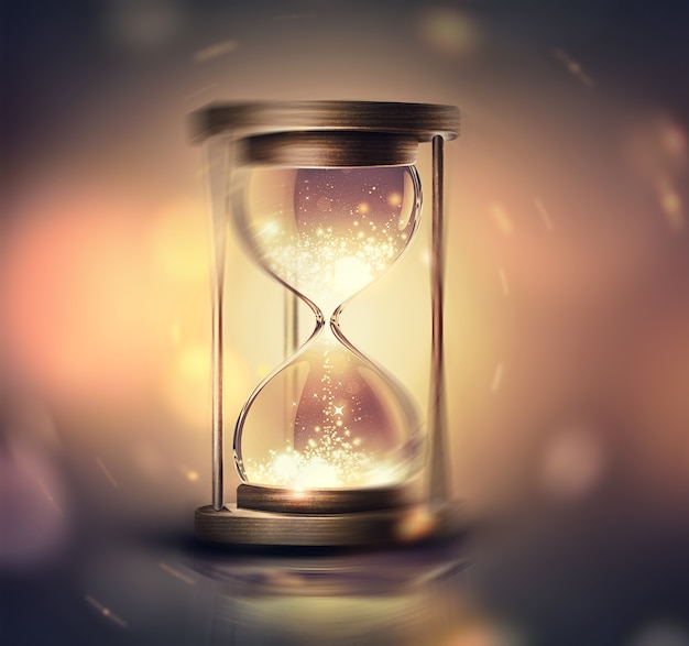 Reloj de arena con luz brillante sobre fondo oscuro con imagen suave efecto bokeh d