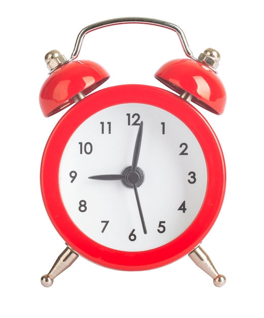 Reloj despertador sobre fondo blanco.
