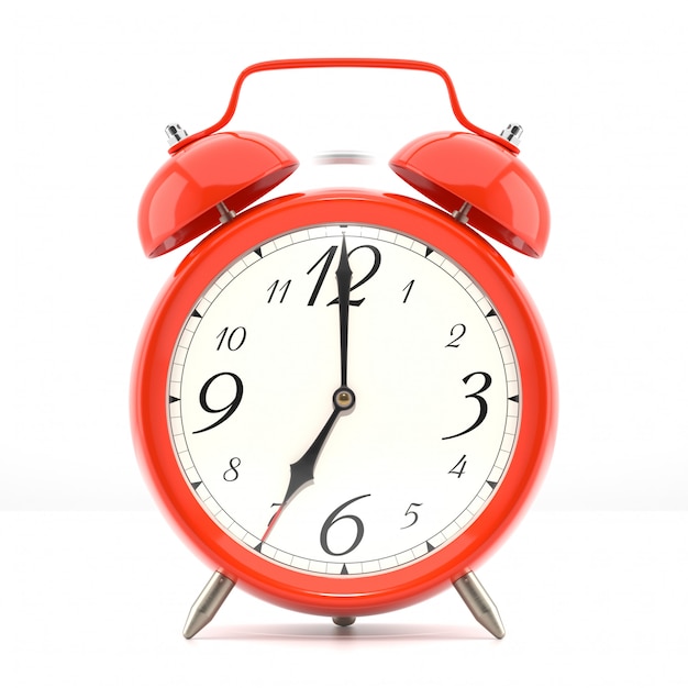 Reloj despertador sobre fondo blanco.
