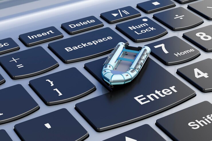 Foto renderizado 3d de un barco inflable en el teclado de una computadora portátil