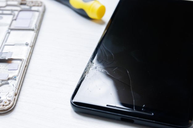 Foto reparación de pantalla de teléfono móvil rota pantalla de teléfono inteligente