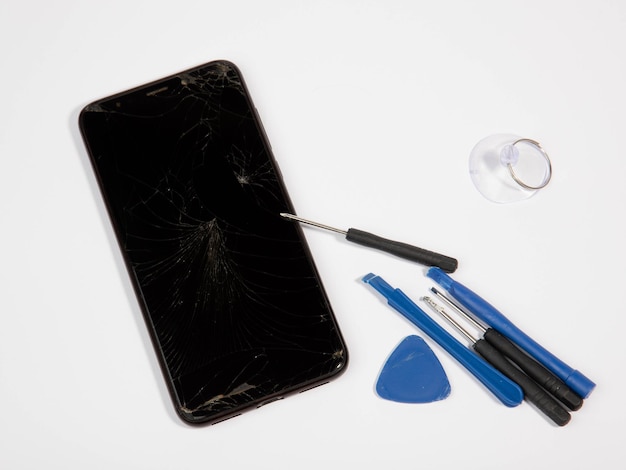 Foto reparación de teléfonos con vidrios rotos de cerca