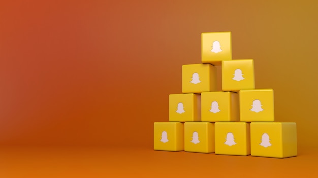 Representación 3D de un montón de logotipos de cubo de Snapchat con espacio de copia