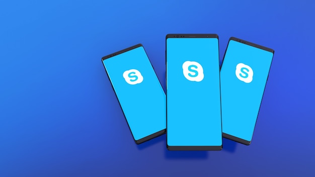 Representación 3D de teléfonos inteligentes con el logotipo de Skype en la pantalla en azul