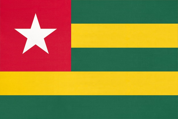 República Togolesa tela nacional bandera textil fondo. Símbolo del país africano del mundo.