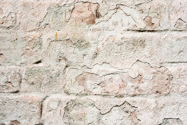 Resistido la textura del viejo fondo de pared de ladrillo verde y blanco manchado