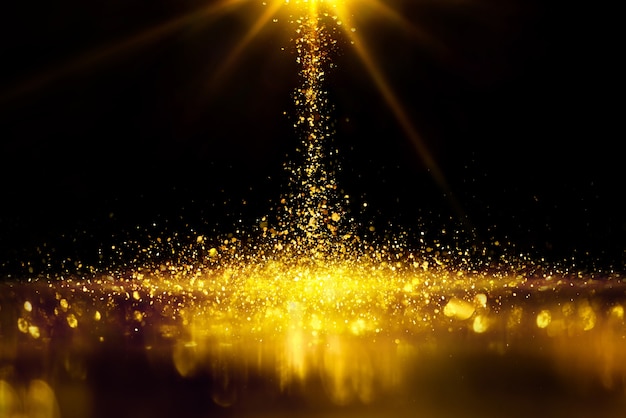 Respingos de glitter dourado são iluminação bokeh