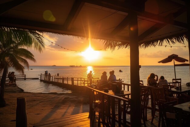 Restaurante à beira-mar com vista para o pôr do sol sobre a água