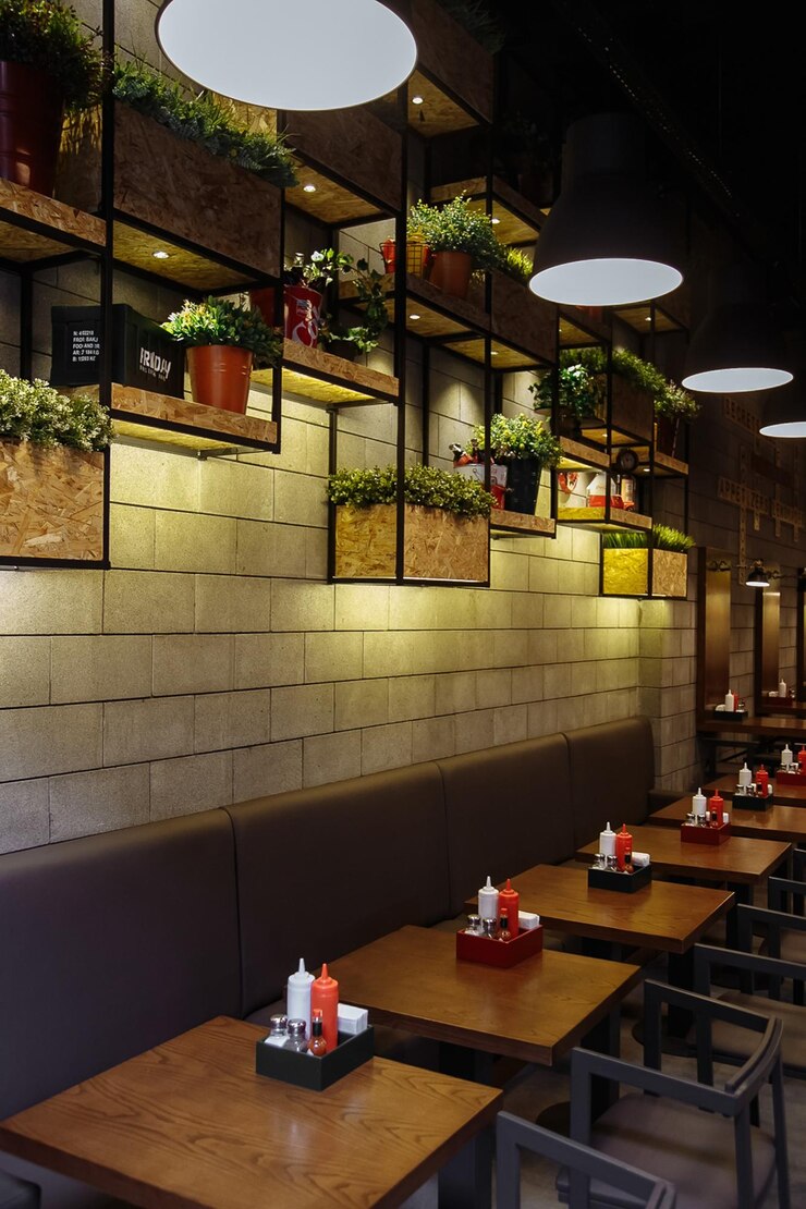 Foto un restaurante con una pared de plantas