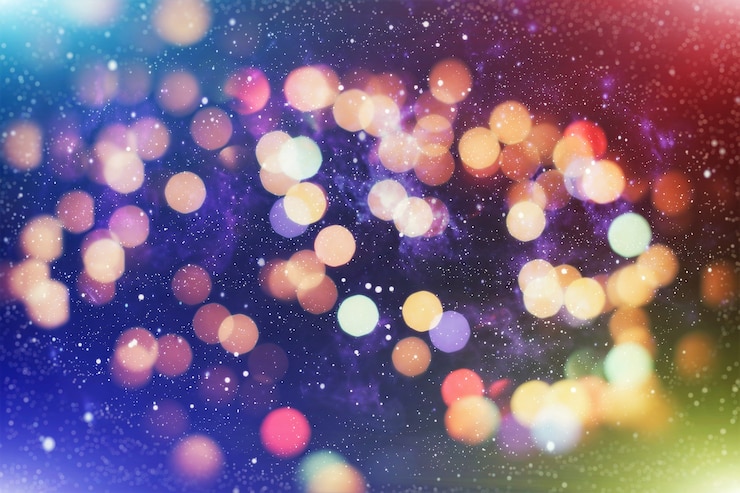 Foto resumen borroso de fondo de luces de bombillas brillantes azules y plateadas: desenfoque del concepto de decoraciones de papel tapiz de navidad.