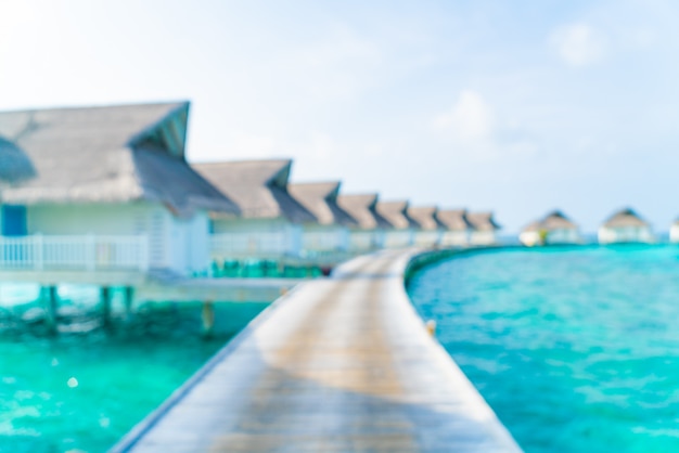 Resumen de desenfoque tropical Maldivas resort hotel e isla con playa y mar de fondo