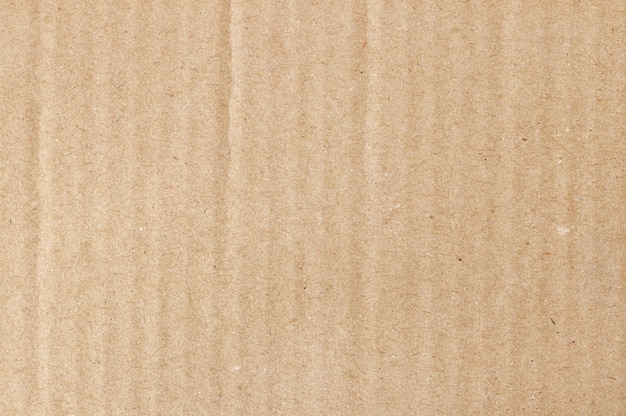 Resumen de hoja de cartón marrón, textura de la caja de papel reciclado en el viejo patrón vintage para el diseño de obras de arte.