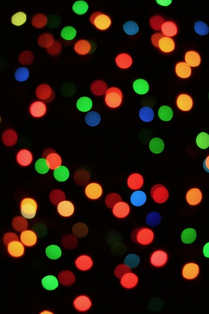 Resumen luces iluminadas de Navidad para fondo o papel tapiz
