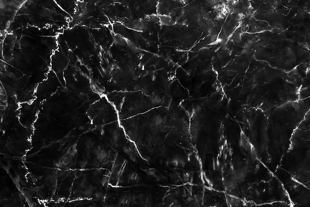 Resumen de patrón de piedra natural de textura de fondo de mármol negro para obras de arte de diseño.