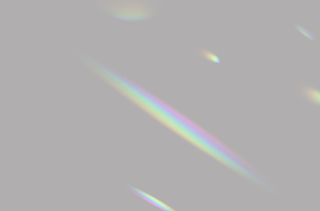Resumen de la superposición de luz del prisma del arco iris borroso sobre un fondo gris para maqueta y decorativo