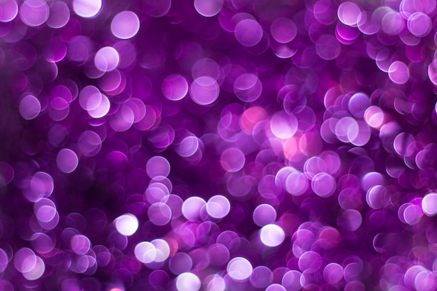 Resumo de férias de brilho brilhante roxo desfocar o fundo bokeh