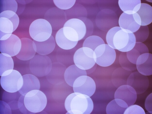 Resumo roxo com luzes desfocadas bokeh