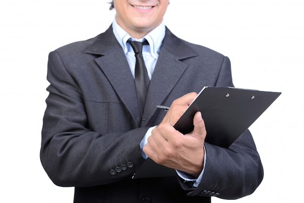 Retrato de alegre joven ingeniero en casco.