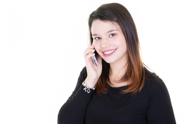 Foto retrato, de, bonito, mulher jovem, usando, telefone móvel, branco, fundo, com, lado, espaço cópia