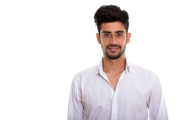 Retrato de jovem empresário persa barbudo bonito