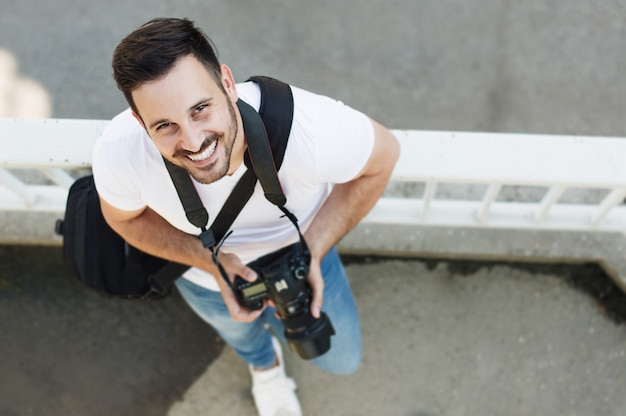 Retrato, de, macho, fotógrafo, com, câmera