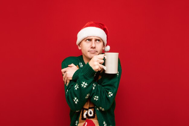 Retrato de menino adolescente com suéter de Natal