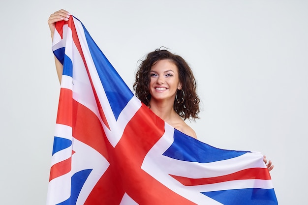 Foto retrato de mulher com bandeira britânica