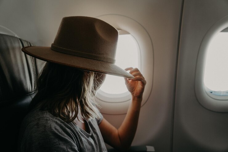 Foto retrato de mulher em avião