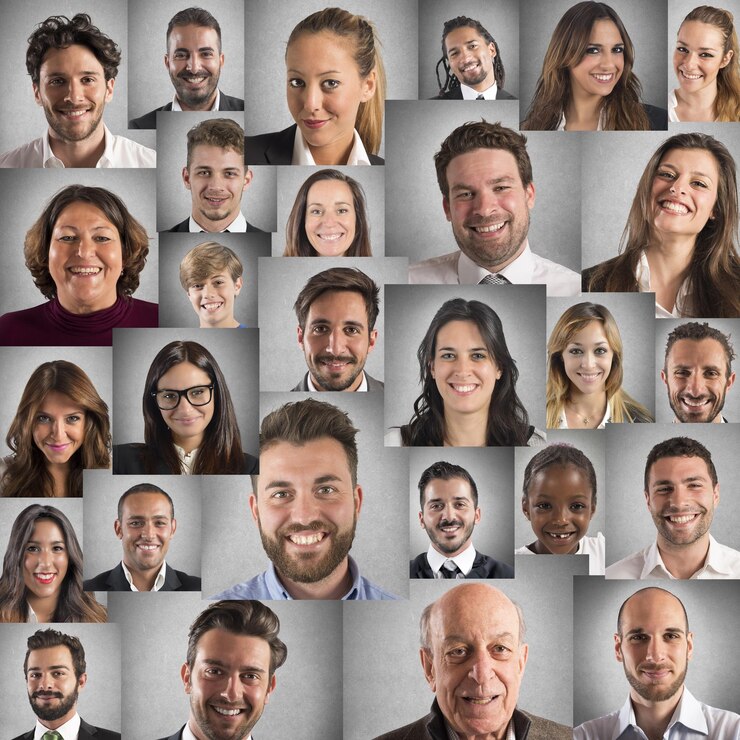Foto retrato de um grupo de pessoas contra um fundo cinzento