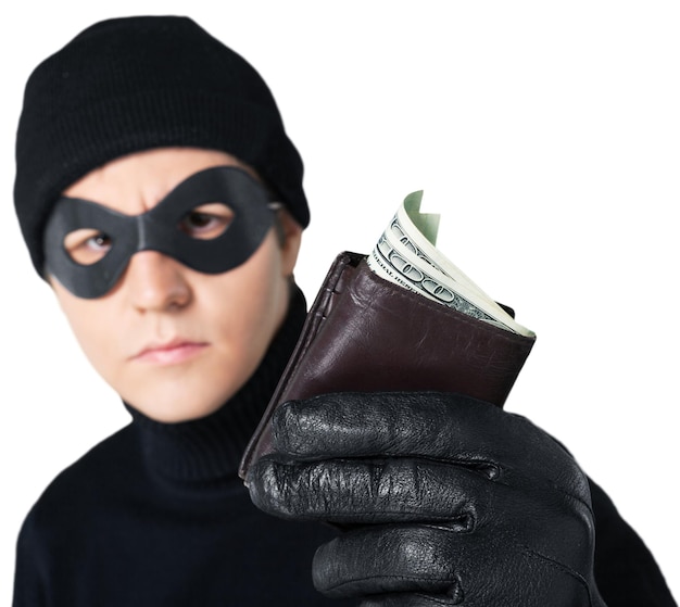 Foto retrato de um ladrão segurando uma carteira com dinheiro