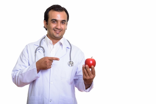 Retrato do médico persa feliz com maçã vermelha